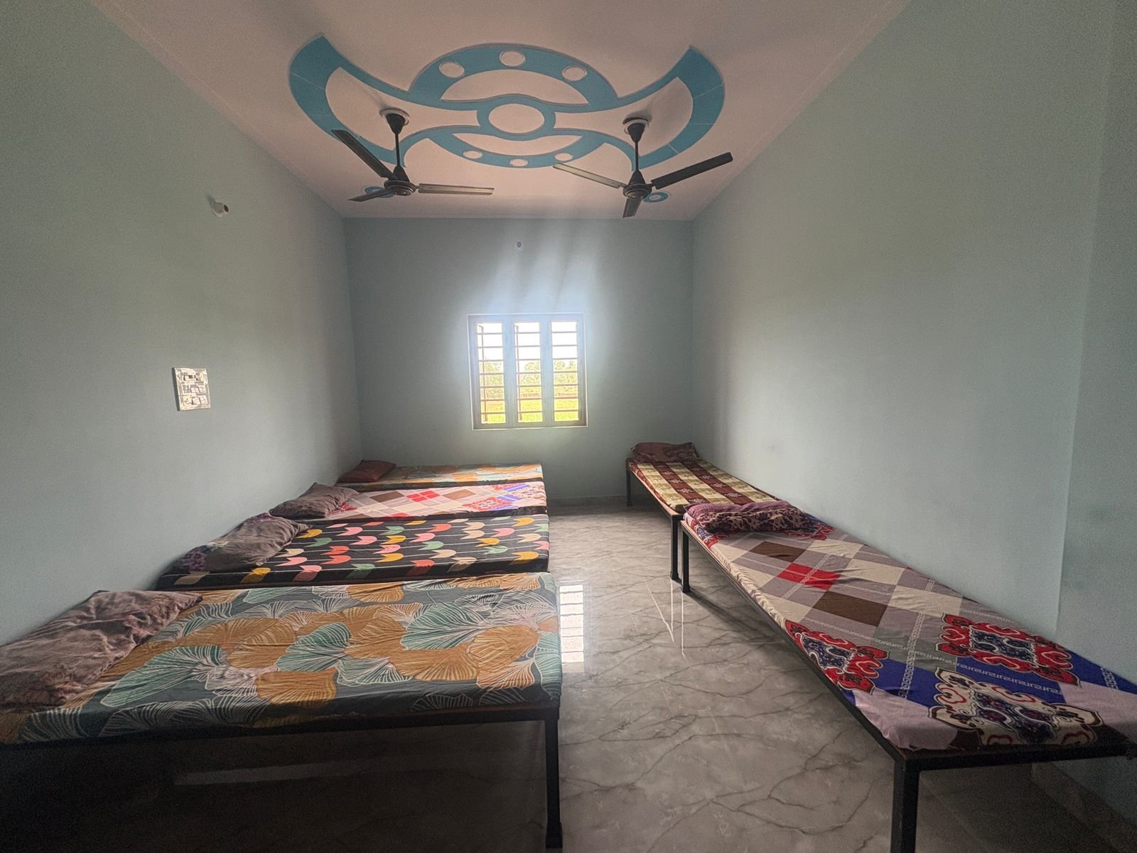 Shared residential room at Unnati Wellness Centre / आवासीय कक्ष